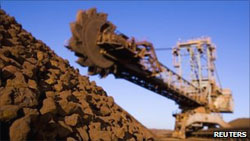 OECD says Australia extend mining tax