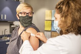 Doctor giving vaccine