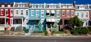 A row of colorful townhouses A row of colorful townhouses